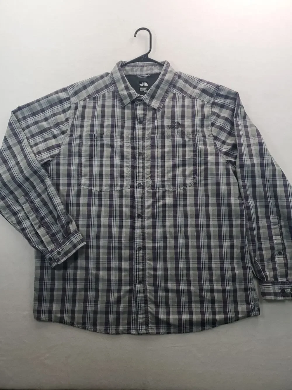 The North Face collared plaid men’s button front shirt